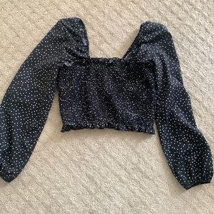 Bunched top with puffy sleeves, light material only worn once in great condition